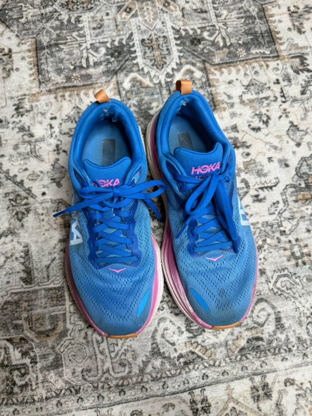 Hoka One One Women's Blue Running Shoes with Pink and Orange Accents